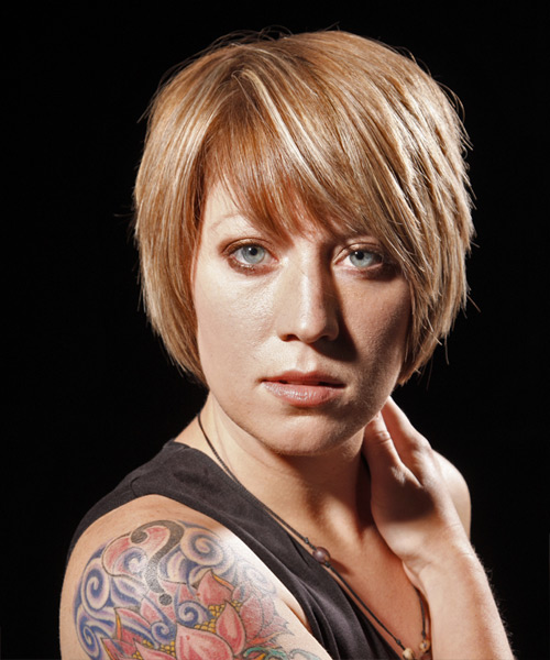 Short Choppy Hairstyle With Light And Medium Blonde Two-Tone Hair Color