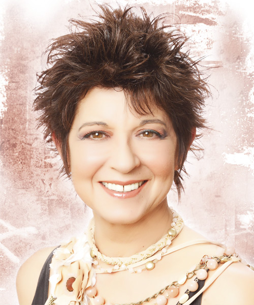 Short Textured Hairstyle With Uniform Layers And Body