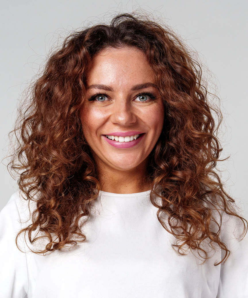 Voluminous Medium-Length Hairstyle With Natural Curls