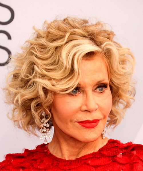 Jane Fonda Medium Curly    Blonde Bob  Haircut with Side Swept Bangs - side on view
