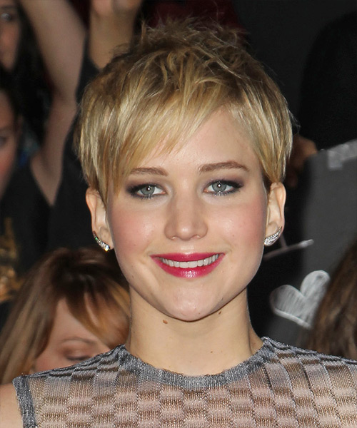 Jennifer Lawrence      Golden Blonde Pixie  Haircut with Side Swept Bangs  and Light Blonde Highlights