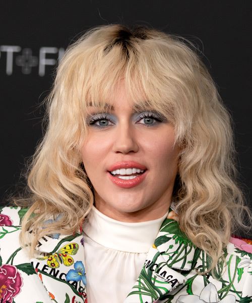 Miley Cyrus Shoulder-Length Bob Haircut With Wispy Bangs