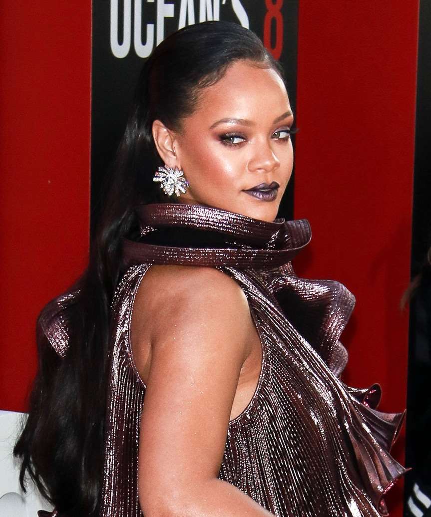 Rihanna Sleek Swept Back Hairdo - side on view