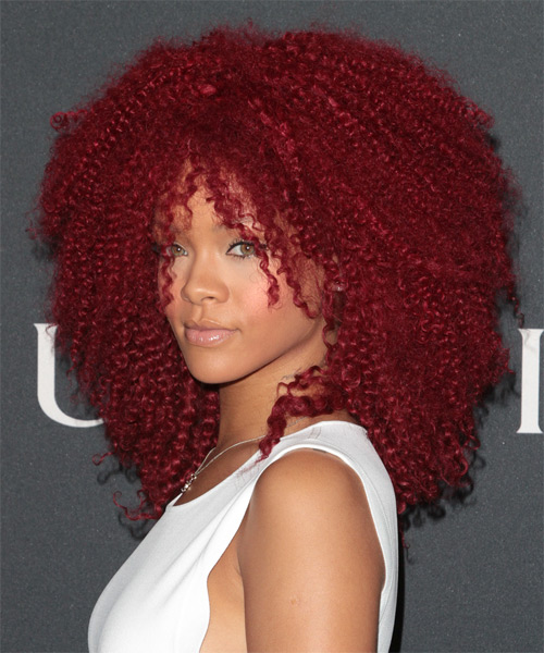 Rihanna Voluminous Bright Red Curls - side on view