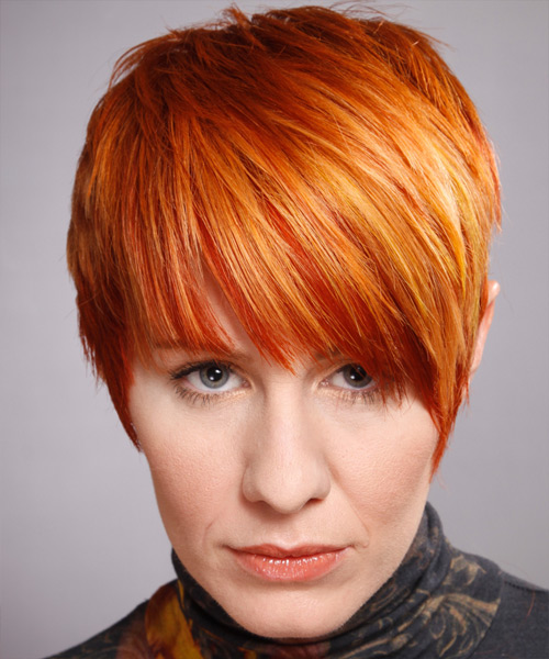 Short Copper Hairstyle With Bright Highlights