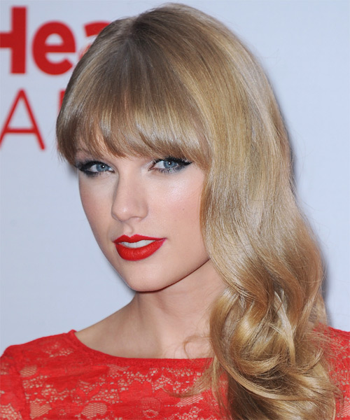 Taylor Swift Long Wavy    Blonde   Hairstyle with Blunt Cut Bangs - side on view