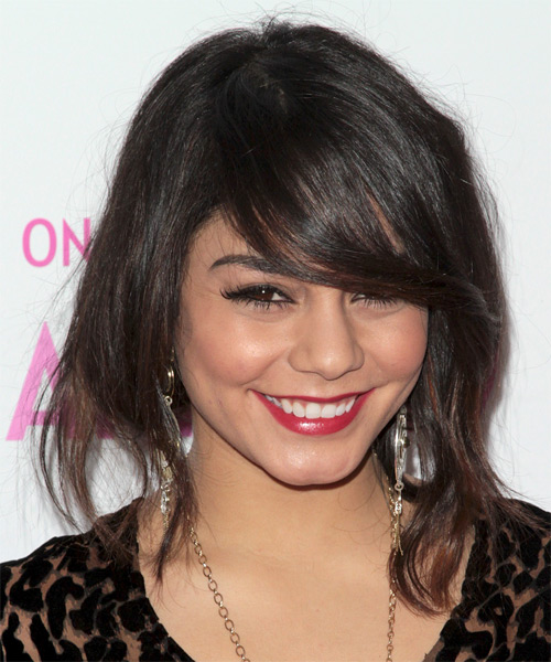 Vanessa Hudgens Medium Wavy   Dark Brunette   Hairstyle with Side Swept Bangs - side on view